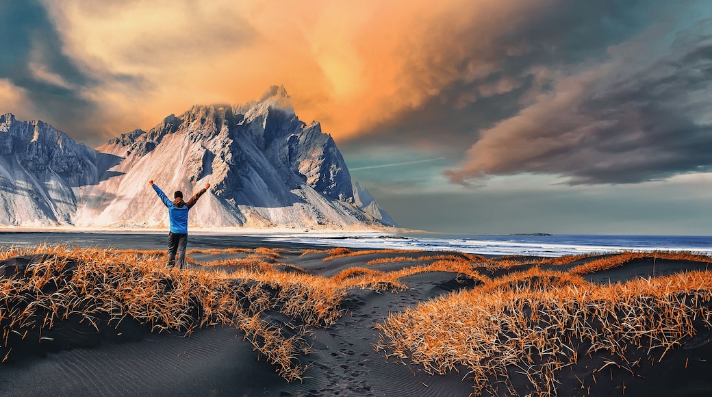 Impressive view of Vestrahorn mountaine on Stokksnes cape in Iceland during sunset. Amazing Iceland nature seascape. popular tourist attraction. Best famouse travel locations. Scenic Image of Iceland