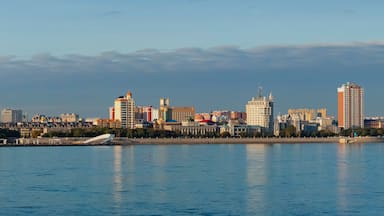View of the embankment of the city of Heihe, China from the city of Blagoveshchensk, Russia. Border river Amur in the autumn morning.