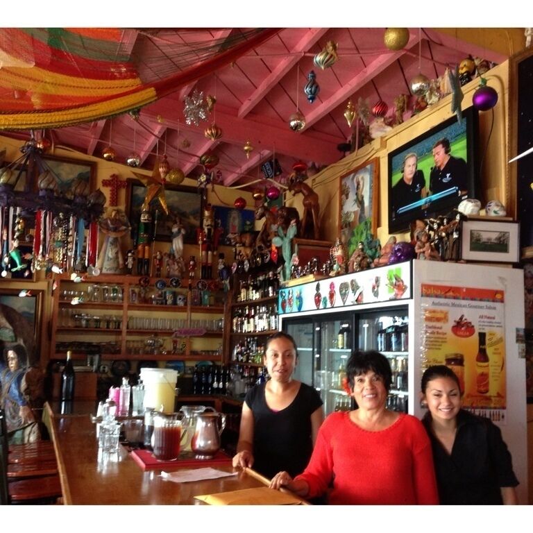 Crazy Mexican decor.  see the hot rod marlin, eat the carnitas tomatillo, and drink the Casa made organic tequila.  Tricky Dick pics on the wall.  Really enjoyed this place.  