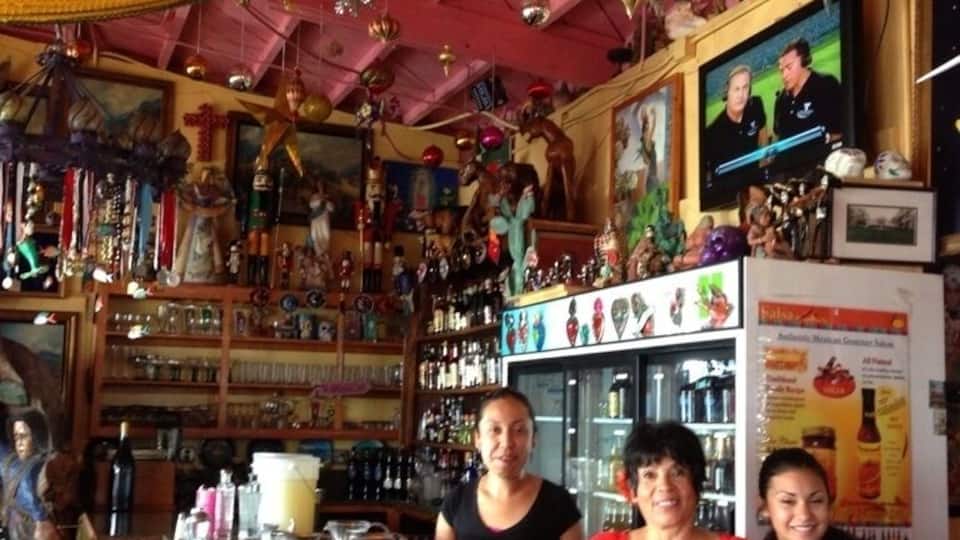Crazy Mexican decor. see the hot rod marlin, eat the carnitas tomatillo, and drink the Casa made organic tequila. Tricky Dick pics on the wall. Really enjoyed this place.