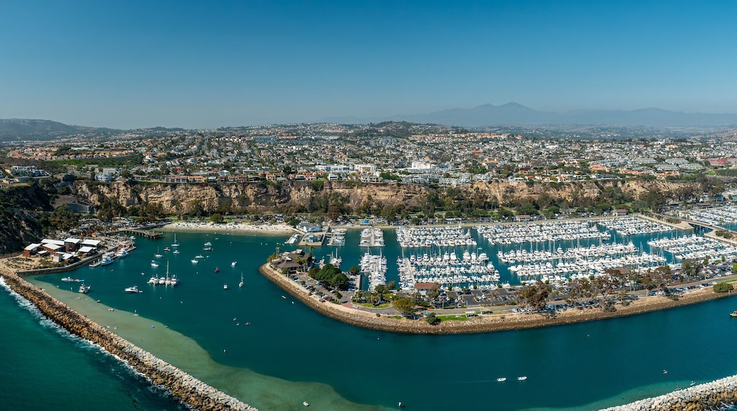 Aerial Panoramic View of Dana Point Harbor and Jetty with Many Boats