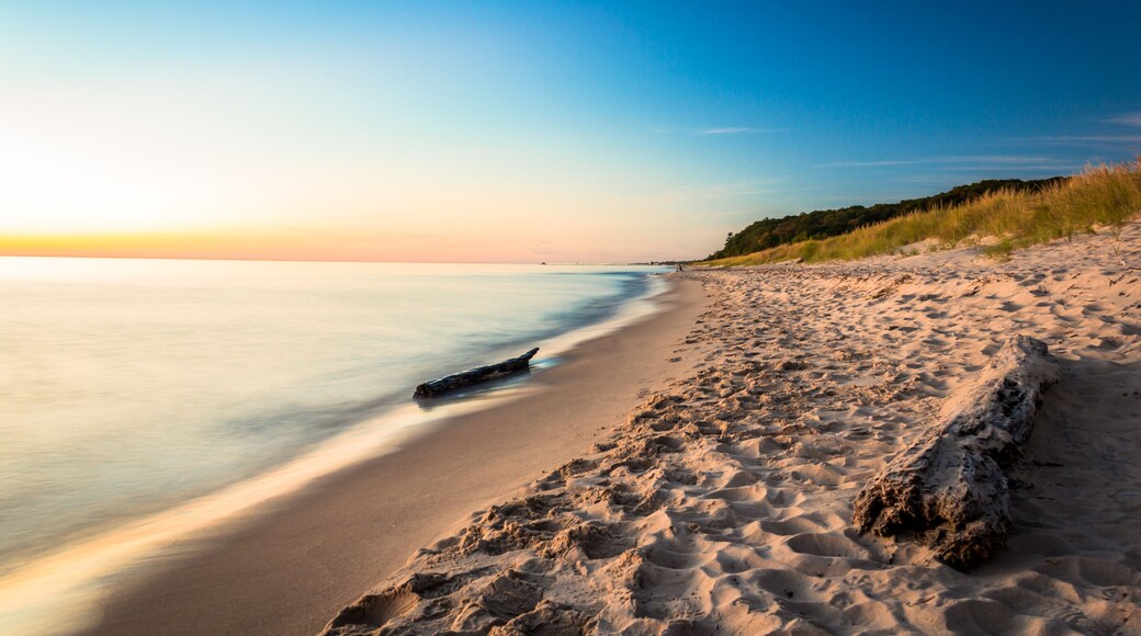 Lake Michigan Pastels. Glowing Beach at Sunset. Natural Beauty Background with Copy Space.