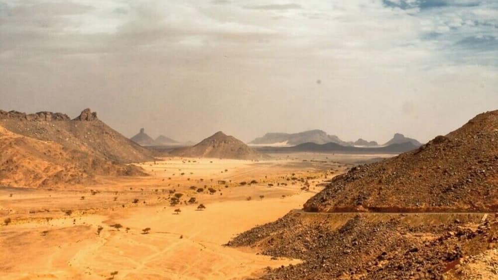 May 2011
Sahara, Tassili n'Ajer
view from pass (aqba) Tin Taharadjeli towards Erg Admer desert in the south. The pass is ca. 1.300 m and leads north to Iherir village. The sandstone sediments are typical for this part of Tassili n'Ajer region..