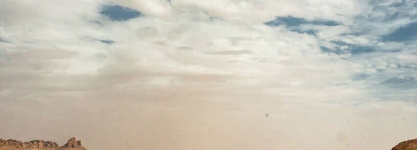May 2011
Sahara, Tassili n'Ajer
view from pass (aqba) Tin Taharadjeli towards Erg Admer desert in the south. The pass is ca. 1.300 m and leads north to Iherir village. The sandstone sediments are typical for this part of Tassili n'Ajer region..
