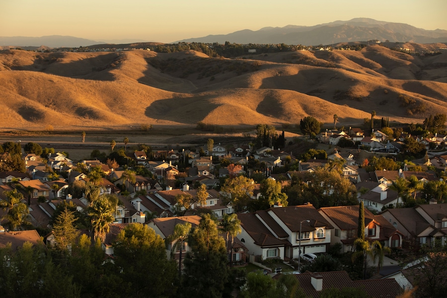 Sunset view of a suburban neighborhood in Diamond Bar, California, USA, with the Chino Hills in the background.