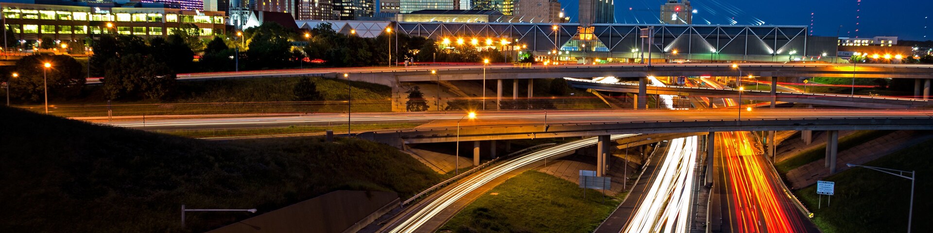 image of the Kansas City skyline and busy highway system leading to the city.