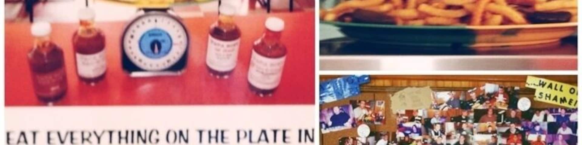 Ok, so I don't write about or "review" food very often. However, in a case like this, I need to. We've all heard at some point or another that Kansas City is the place for BBQ. Today I was in Bonner Springs, a small town just outside of K.C. There really isn't any reason to ever go there, unless, you want a phenomenal BBQ experience. You will be met by some exceptionally nice & friendly owners, Papa Bob and his wife. The place is only 5 years old, and for the most part, off the beaten path. But Papa Bob has made a name for himself out here. This is BBQ country, and when it comes to BBQ, no one is counting calories; especially, Adam Richman, star of The Food Network's, "Man vs. Food." Adam was at Papa Bob's not too long ago, attempting to defeat "The Ultimate Destroyer Challenge!" What is it you ask? I'll let Papa Bob tell you...
"SPREAD OUT ON THE FIRST LAYER OF THE 12” HOAGIE BUN IS A HALF POUND OF MOUTHWATERING PULLED PORK. ATOP THAT, A HALF POUND OF HICKORY SMOKED SLICED PORK. ABOVE A GENEROUS SQUIRT OF PAPA BOB’S REGULAR SAUCE, WE ADD TWO SLICES OF BREAD. NEXT COMES A HALF POUND LAYER OF SLICED, HICKORY SMOKED HAM WITH A HALF POUND LAYER OF HICKORY SMOKED TURKEY BREAST ABOVE THAT. FOLLOWING THE SAUCE AND TWO MORE PIECES OF BREAD, ADD THREE, COUNT ‘EM, THREE, HALF POUND HICKORY SMOKED HAMBURGERS WITH ANOTHER GENEROUS SQUIRT OF SAUCE. ADD THE BREAD AND HERE COMES THE BEEF. A HALF POUND OF TENDER HICKORY SMOKED BRISKET SPREAD OUT WITH A HALF POUND OF LEAN, HICKORY SMOKED BBQ SAUSAGE AS THE LAST LAYER FOLLOWED WITH YET ANOTHER SQUIRT OF SAUCE. ALL THIS WILL TRY TO BE CAMOUFLAGED WITH THE TOP OF THE HOAGIE BUN.
FOR YOUR CULINARY ENJOYMENT, WE’RE ADDING ONE AND ONE HALF POUNDS OF FRIES AND FOUR DILL PICKLE SPEARS OR FOUR JALAPENO PEPPERS TO COMPLETE THE “ULTIMATE DESTROYER CHALLENGE”
Drooling yet? Think you could handle all of that? Well, if you think you can muster to put down all 4 1/2 lbs of this meal'o'heartattack, then you should give it a shot. Because if you can clean your plate in under 45 minutes; that $55 sandwich you just ordered will be free! Plus, you'll get your picture up on the wall next to the two others that have completed the challenge successfully. If you don't finish it in under 45 minutes, you still get your picture on the wall, you just get to have your picture next to Adam's on Papa Bob's "Wall of Shame."
Next time you're traveling through Kansas City, do yourself a huge favor and stop by here. It is a delightful experience! And if you don't want the Ultimate Destroyer, than try the burnt ends... They're absolutely amazing!