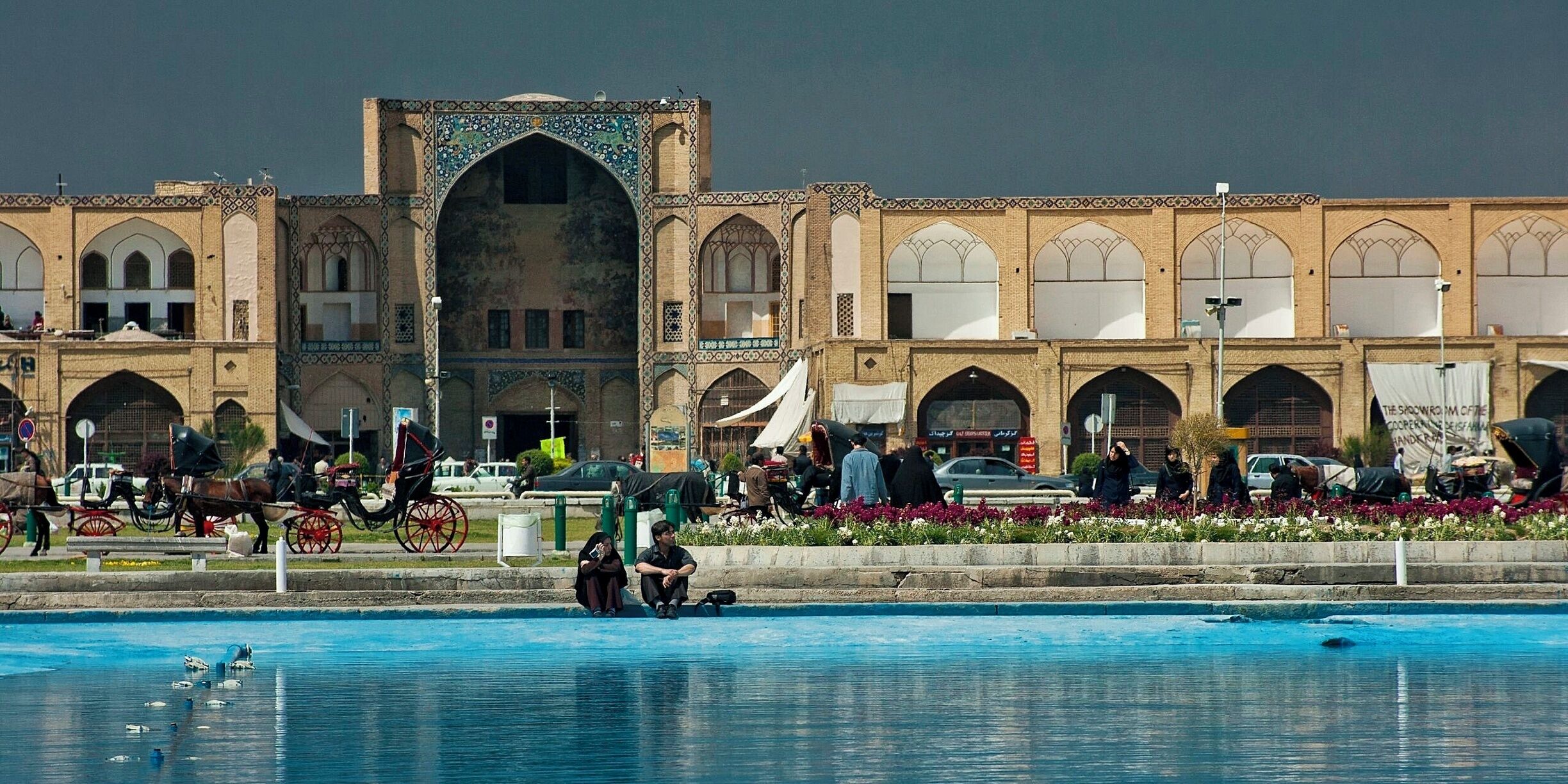 April 2009

Naqsh-e Jahan square, Esfahan, Iran

Naqsh-e Jahan is the central square of Esfahan, it literally means half of the world and it is even after 400 years presumably the 2nd largest square in the world. 
Constructed between 1598 and 1629, it is now an important historical site, and one of UNESCO's World Heritage Sites. It is 160 metres (520 ft) wide by 560 metres (1,840 ft) long (an area of 89,600 square metres (964,000 sq ft)).
A place of erernal calm and ellegance indeed.
