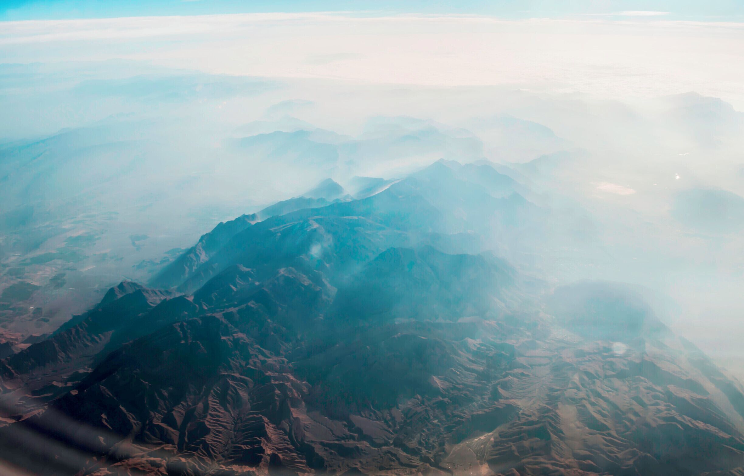 This is a photo taken while flying from Dubai to Oslo. I was looking for this shot for a while as one of my friends has taken some beautiful photos here. This region is completely filled with this kind of mountains and it is really nice to see. Don't forget to book a window seat and grab some beautiful pictures if you are flying over Iran.