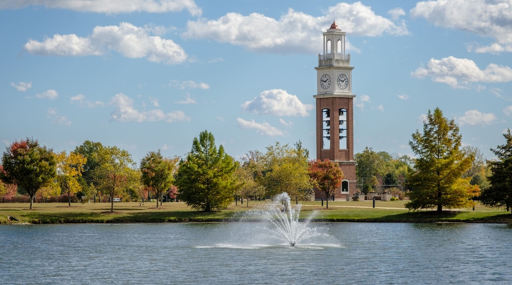 Bell tower and lake in Coxhall Gardens in Carmel, Indiana