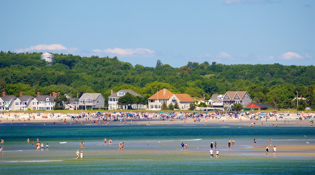 Scarborough featuring a coastal town and general coastal views as well as a large group of people