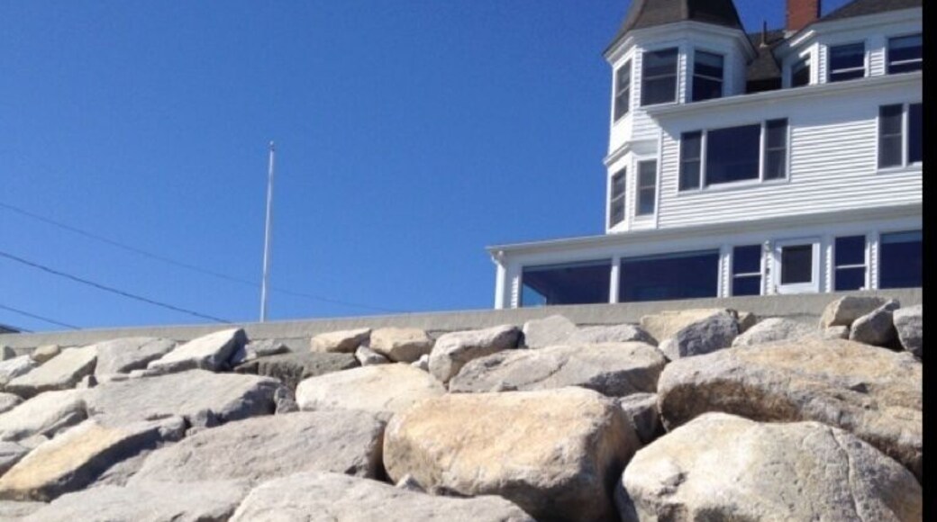 Another great point of view of this B&B looking back from laying on the beach below the rocks.