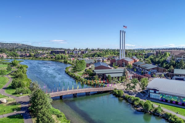 Summertime in Old Mill District on the Deschutes River in Bend, Oregon