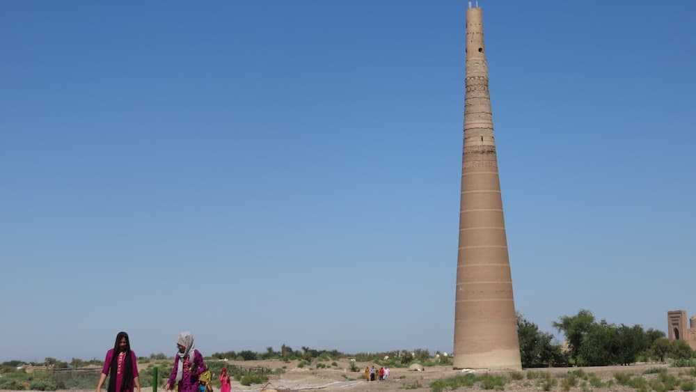 The Kutlug-Timur minaret raises its column high above a vast flat plain of this UNESCO world heritage area.