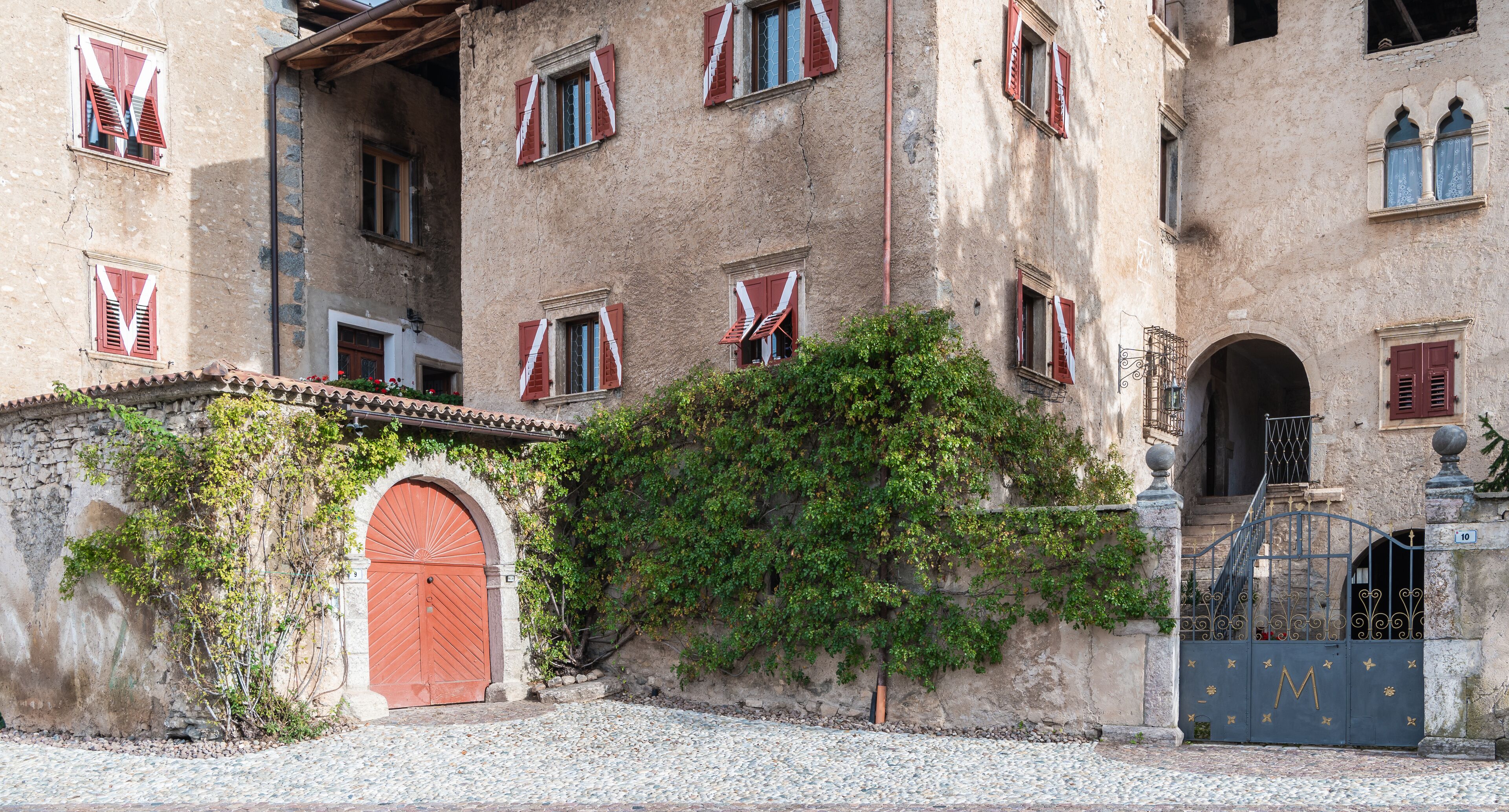 The medieval Casez Castle (or Palazzo Concini) XV century -  details of the facade, Sanzeno, Non valley, Trento province, Trentino Alto-Adige, Italy, Europe -  November 12, 2022