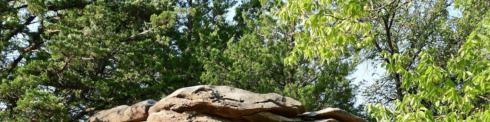 eroded mushroom rock formation in the roadside attraction of mushroom rock state park, near salina, in north central kansas