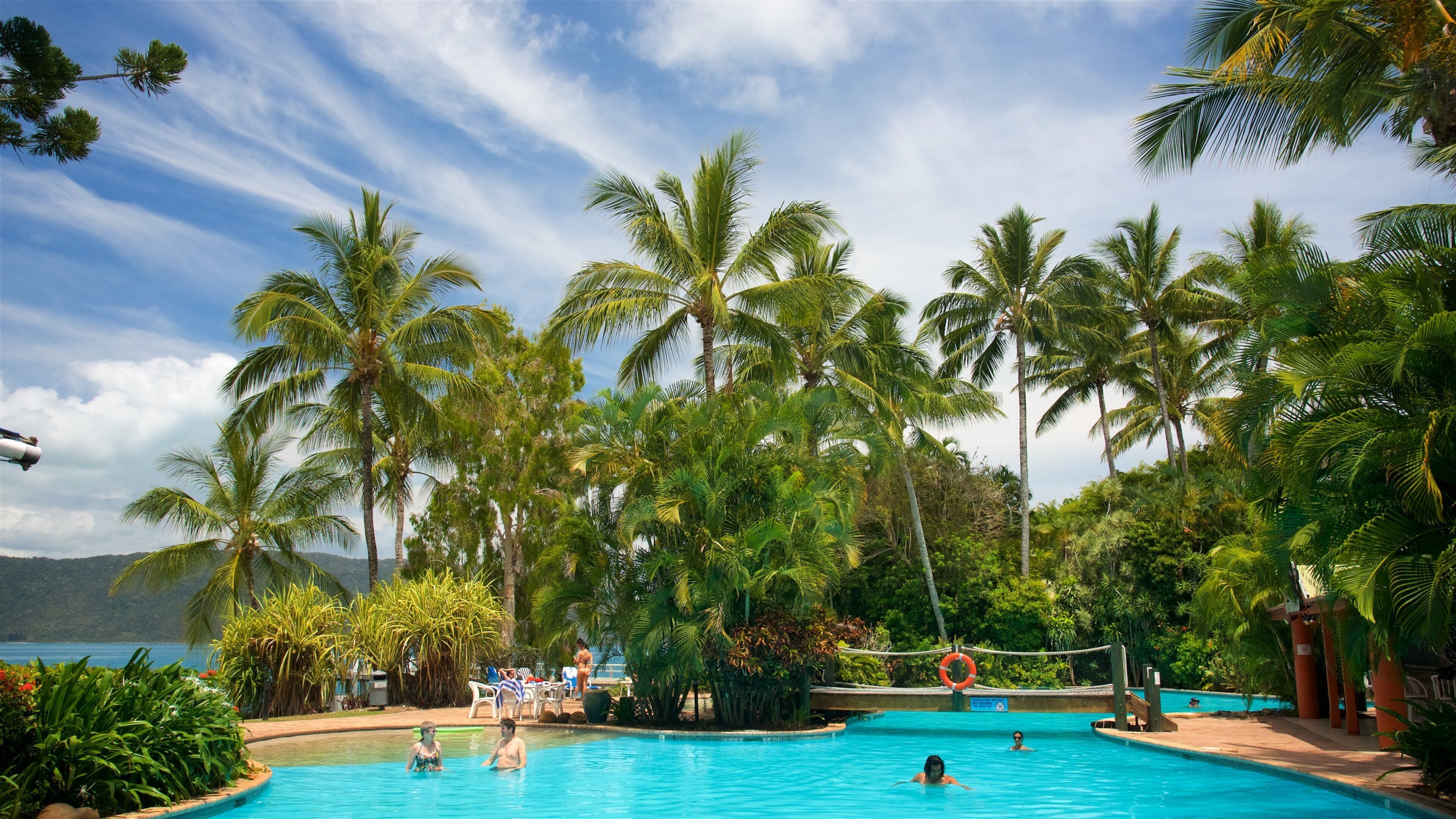 Daydream Island which includes a luxury hotel or resort, a pool and swimming
