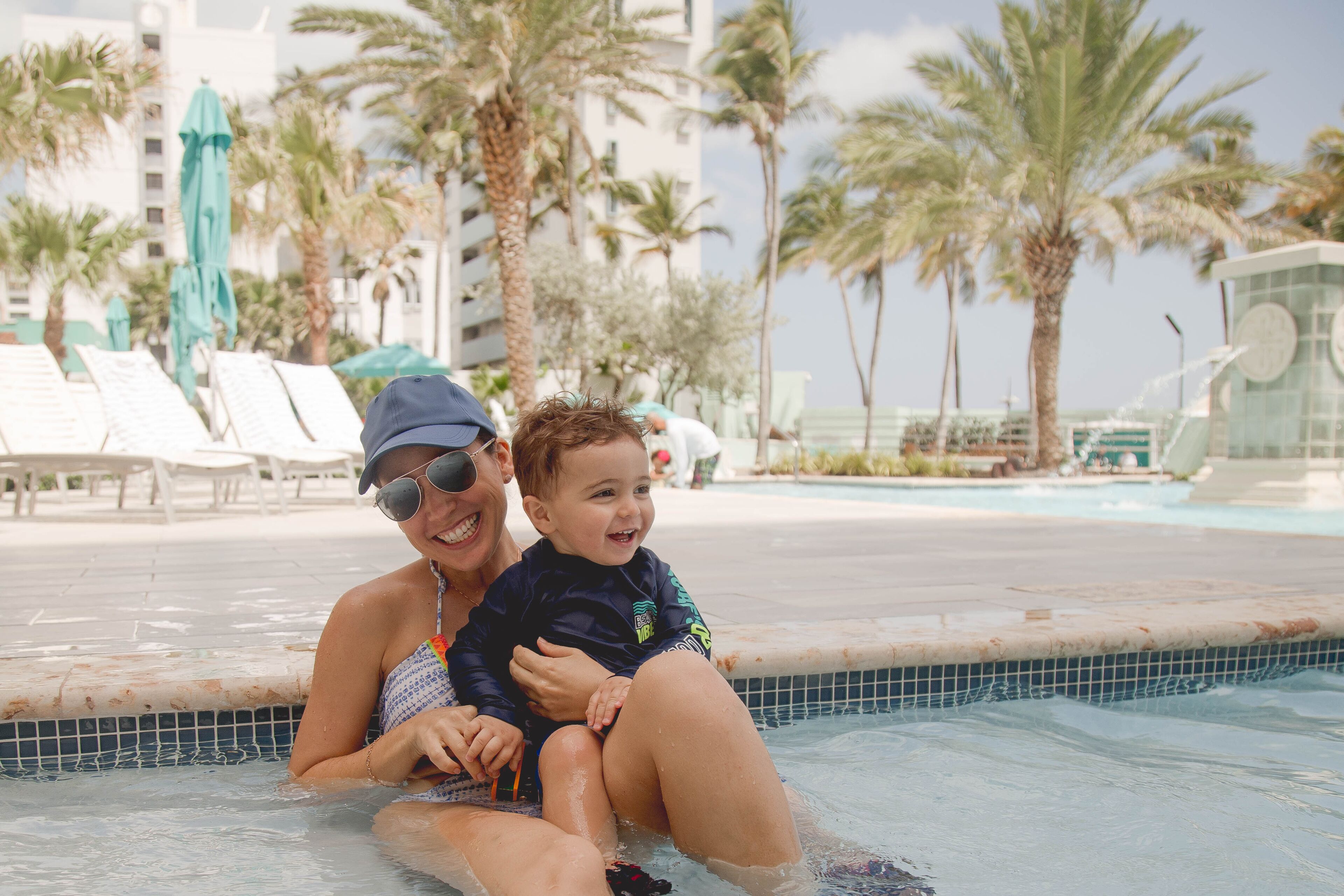 mother and son on the beach pool at the Marriott Stellaris Puerto Rico Condado beach in Carolina