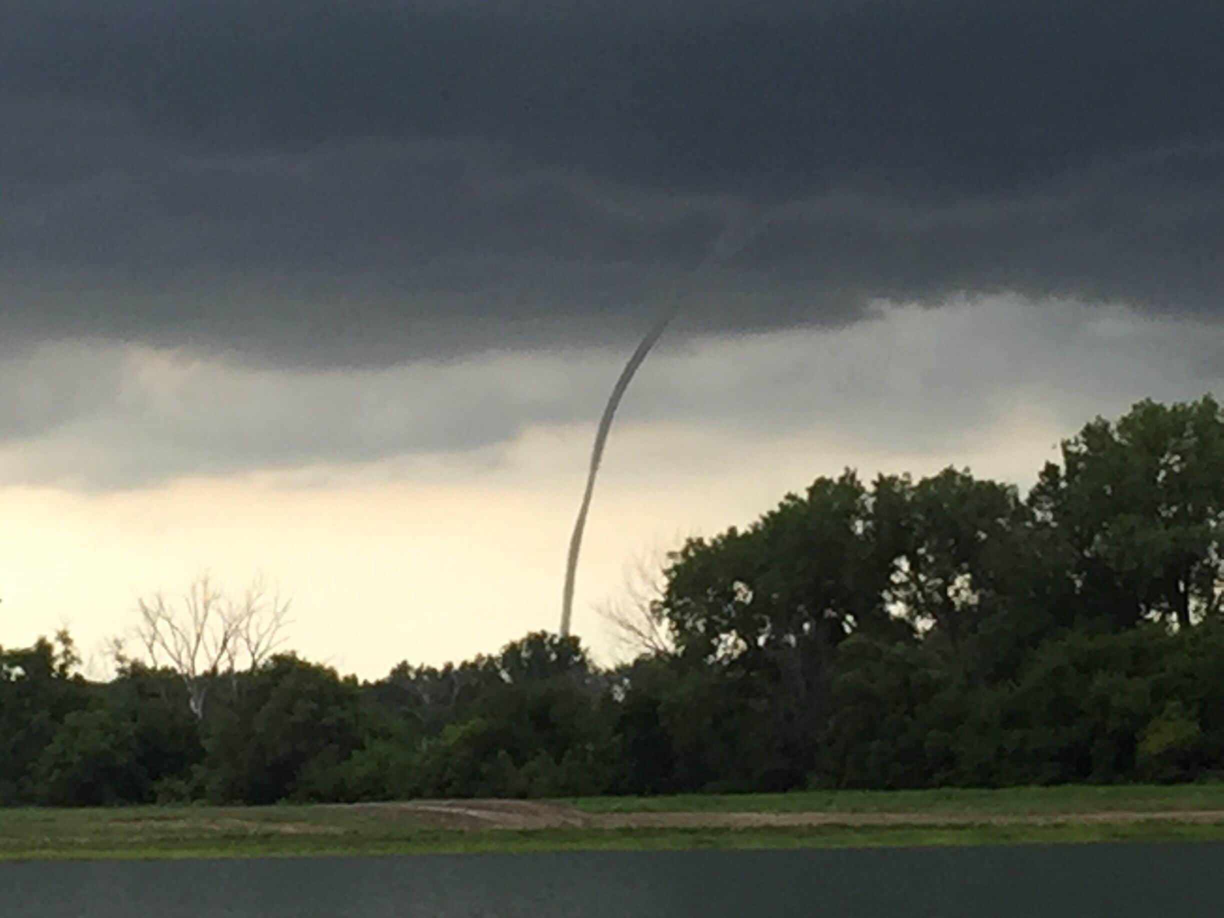 A rope tornado across the river in Iowa