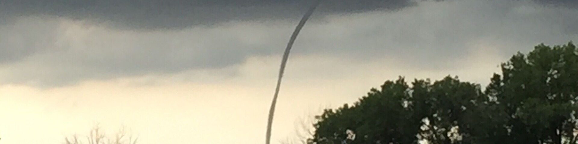 A rope tornado across the river in Iowa
