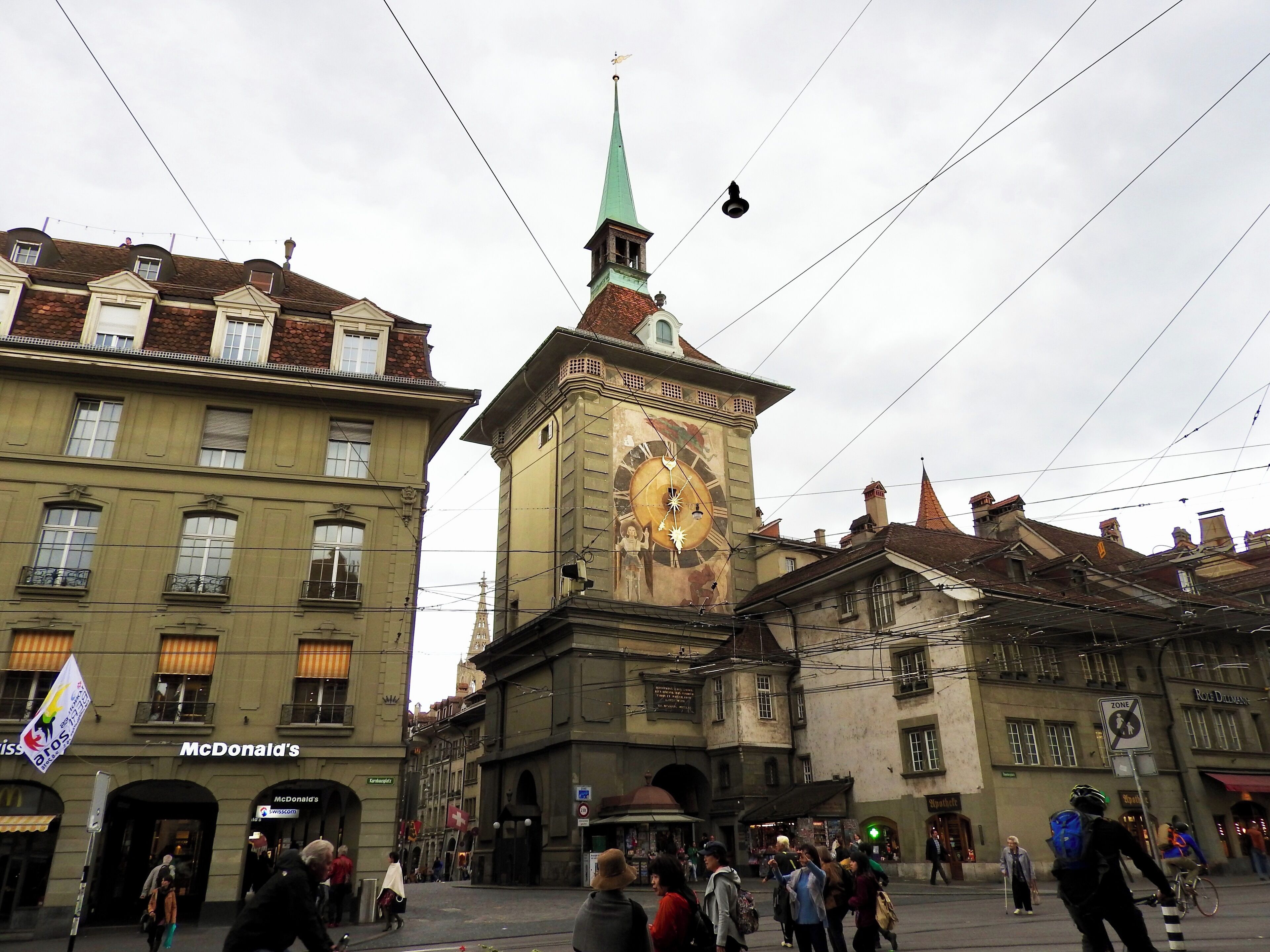 The western clock face of The Zytglogge (Bernese German: /ˈt͡sitˌklɔkːə/) tower is a landmark medieval tower in Bern, Switzerland. Built in the early 13th century, it has served the city as guard tower, prison, clock tower, centre of urban life and civic memorial.

Despite the many redecorations and renovations it has undergone in its 800 years of existence, the Zytglogge is one of Bern's most recognisable symbols and, with its 15th-century astronomical clock, a major tourist attraction. It is a heritage site of national significance, and part of the Old City of Bern, a UNESCO World Cultural Heritage site. (Wiki) (May 2016)

#OnTheRoad #Trovember