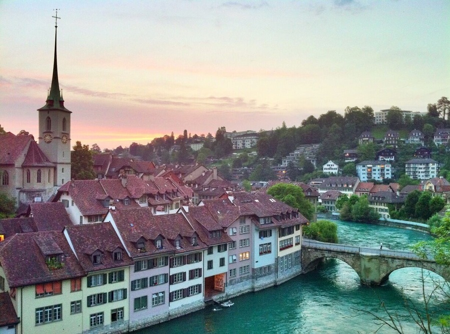 #TroveOn
Sunset from the Nydeggbrücke bridge, just outside the old town of Bern. The Bern Altstadt is a UNESCO world heritage site, and I swear I have never seen a river more brilliantly turquoise than the River Aare, which encircles the Altstadt. The Swiss capital is a definite must for a Switzerland itinerary.