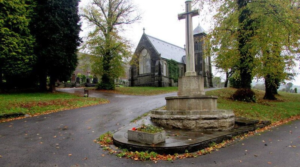 War Memorial Cross in Trealaw Cemetery Located near the main cemetery entrance from Brithweunydd Road. The Grade II listed cemetery chapel is in the background.