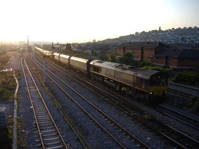 An EWS freight train trundles eastwards, from Newport