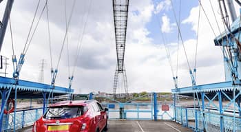 The coolest "bridge" I have ever "driven" across! Drive aboard and take flight over the River Usk in this 110 year old engineering marvel. Only six of these historic bridges remain in operation, and the Newport Bridge is the longest with a 196m span (645ft).
A modern highway bridge passes nearby, so these days the bridge operates as a novelty. Show up on either side, and the operator will come pick you up! You can also climb the steps and walk across the 54m