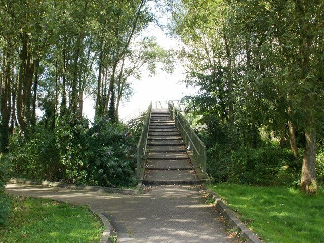 Footbridge steps, Newport Retail Park The steps are on the Newport Retail Park side of a footbridge across Spytty Road.