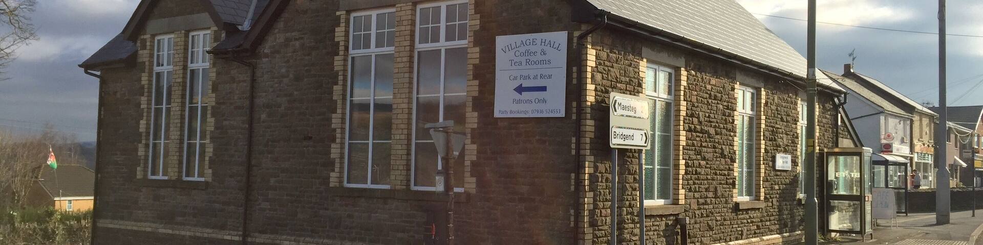 Llangynwyd Village Hall Marked on the OS map as a place of worship, the building now called Llangynwyd Village Hall was originally built as a schoolhouse by the Margam Estate during the 19th Century and used until the existing village Primary School was built in the 1920s. In 1895 it is recorded as having a school roll of 96 pupils. After it ceased being a school it became a church dedicated to St. Stephen. The building was used as a church up until the 1990s before declining church attendance resulted in it being sold for use as an artist’s studio. It was officially opened as the Llangynwyd Village Hall in April 2014.