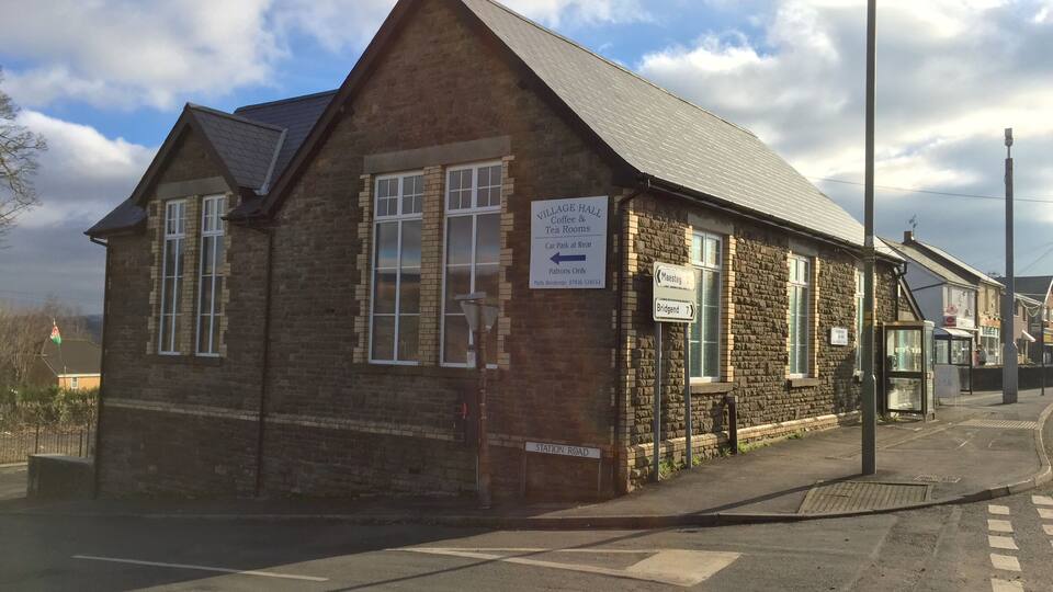Llangynwyd Village Hall Marked on the OS map as a place of worship, the building now called Llangynwyd Village Hall was originally built as a schoolhouse by the Margam Estate during the 19th Century and used until the existing village Primary School was built in the 1920s. In 1895 it is recorded as having a school roll of 96 pupils. After it ceased being a school it became a church dedicated to St. Stephen. The building was used as a church up until the 1990s before declining church attendance resulted in it being sold for use as an artist’s studio. It was officially opened as the Llangynwyd Village Hall in April 2014.
