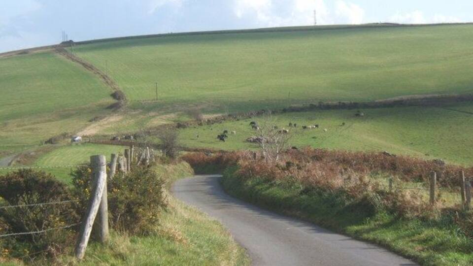 Lane with view to Mynydd Baedan This is an area of upland rolling grazing country with wide views.