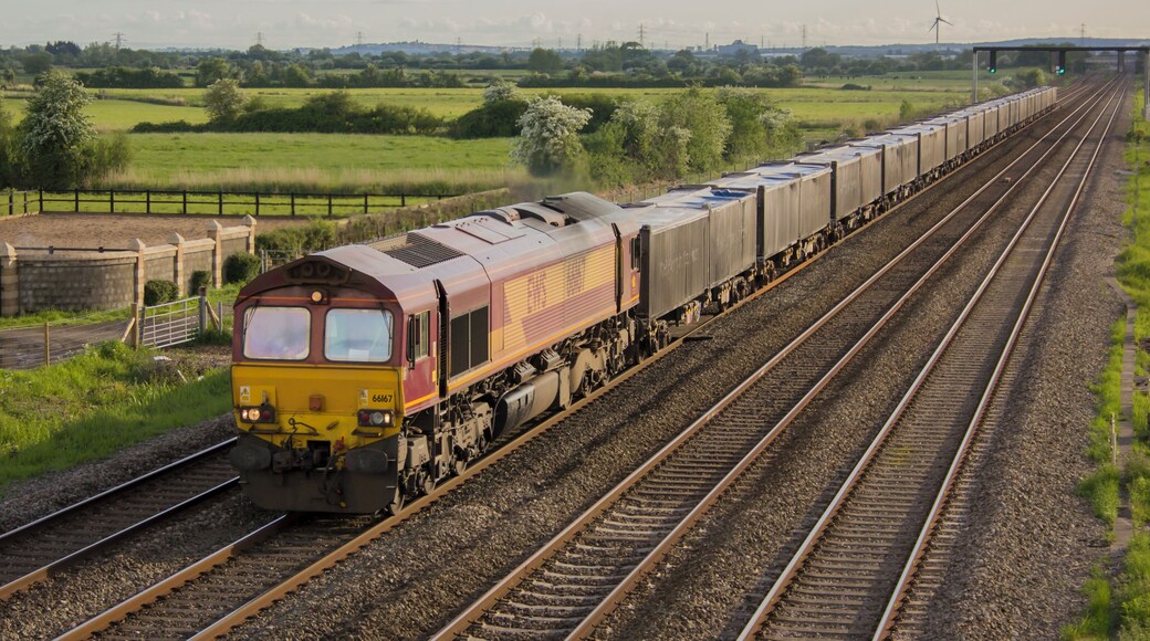 66167 is seen Coedkernew - between Cardiff and Newport, with the 1728 Margam T.C. to Carlisle North Yard.
