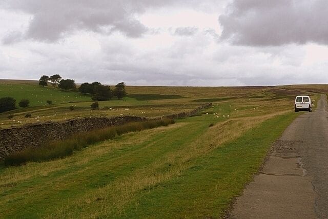 Man-moel Road The road leads from the village of Manmoel over Cefn Manmoel (although strangely the road name has a hypen and the other two don't). It is part of the Sirhowy Valley Walk, but is also driveable with care (it gets worse). I did wonder whether this was a fellow geographer parked up here but I have not seen any photographic evidence yet.