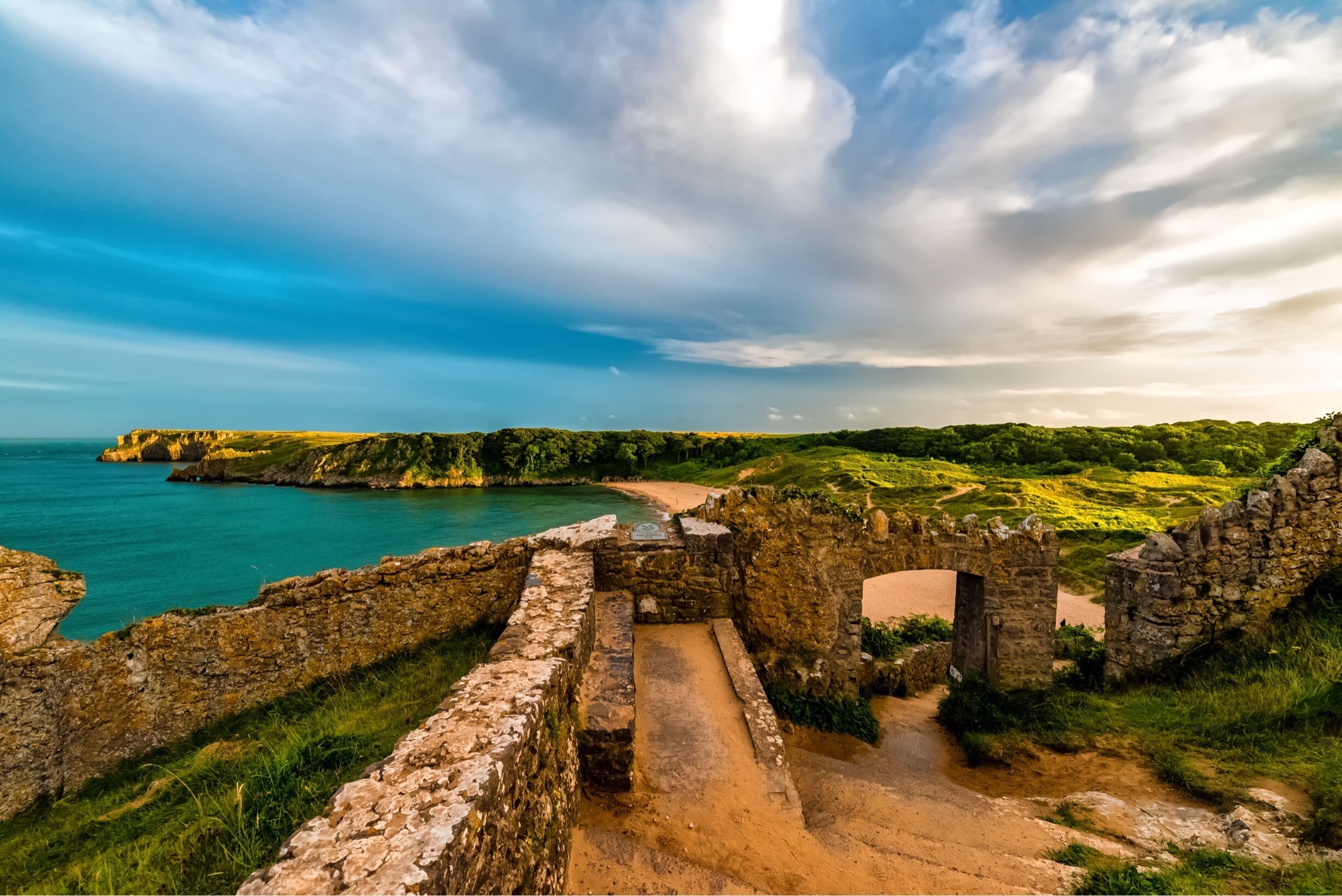 A small bay backed by dunes and pine trees, accessible only by a half mile walk from the nearest car park. Swathes of golden sand and crystal clear waters, Barafundle has been voted many, many times as one of the best beaches in Britain and the world; it’s often likened to a Caribbean beach! This pristine beach is isolated which means no facilities; so everything you take has to come back up over the cliffs.

#instone #remotebeach #roadtrip  #reflections #beach #wales #uk #seaside #sea #coast #coastal #pembrokeshire #britain #stones
Location
Nearest town: Stackpole Quay
County: Benfro / Pembrokeshire
Latitude/Longitude: 51.6175, -4.90087
Postcode: SA71 5LS
(postcode is for sat-nav purposes only, and may not represent the actual address of the beach)

Access
From the road between Stackpole and Freshwater East. take the turning to Stackpole Quay. Access to the bay is via a 1km path leading from the car park. then a steep cliff path.