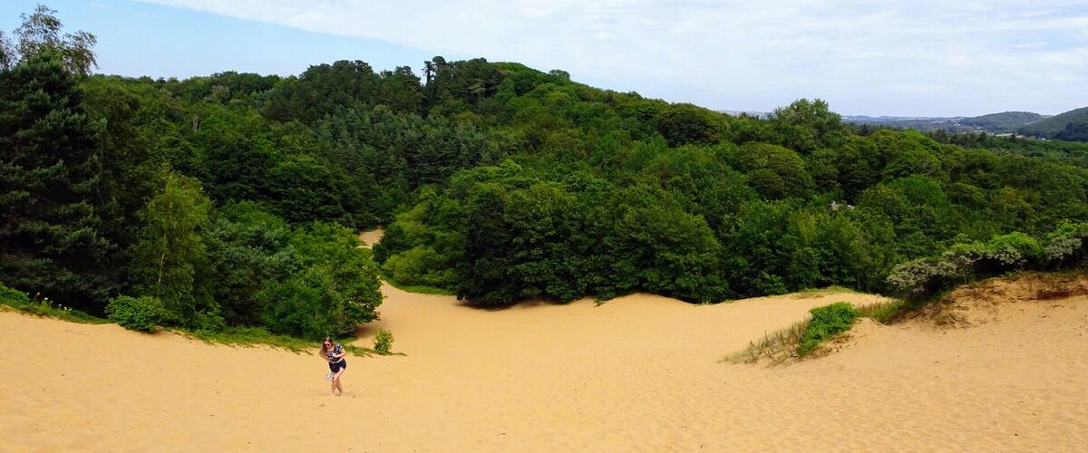 Tucked away on the Coast line not far from Cardiff are these impressive sand dunes. The biggest sand dune in the area labeled 'big dipper' is an impressive 60 meters high making it the second highest sand dune in Europe. Free to roam these dunes with many walking trails (All bare feet hiking!)