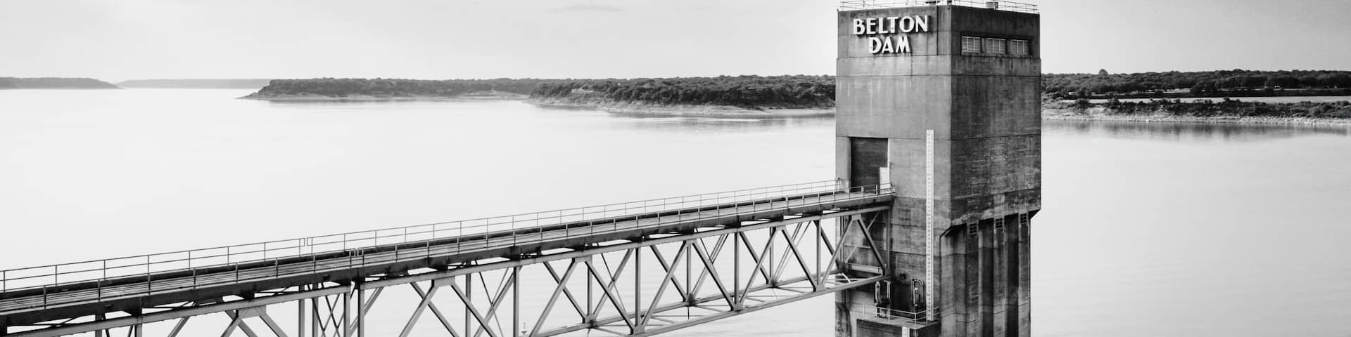 Aerial view of a Belton dam buidling crossing the lake