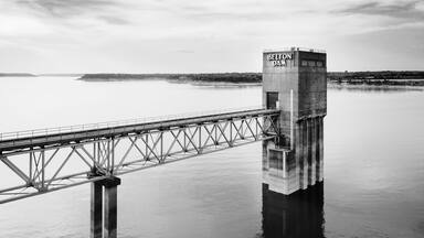 Aerial view of a Belton dam buidling crossing the lake