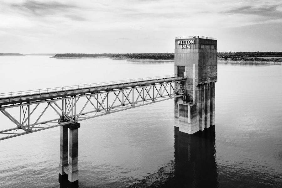 Aerial view of a Belton dam buidling crossing the lake