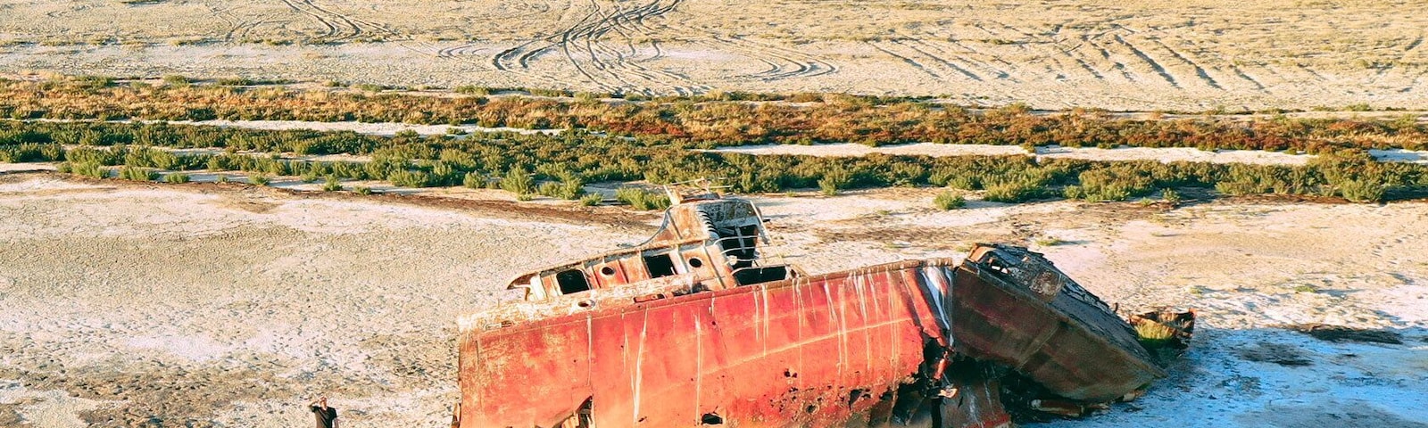 Old rusted ships are scatted along the shore of the receding Aral sea. The booming cotton industry in the south has slowly drained the lake. Very recently, efforts have been made to restore the lake to its former volume. Soon this ships will gone.