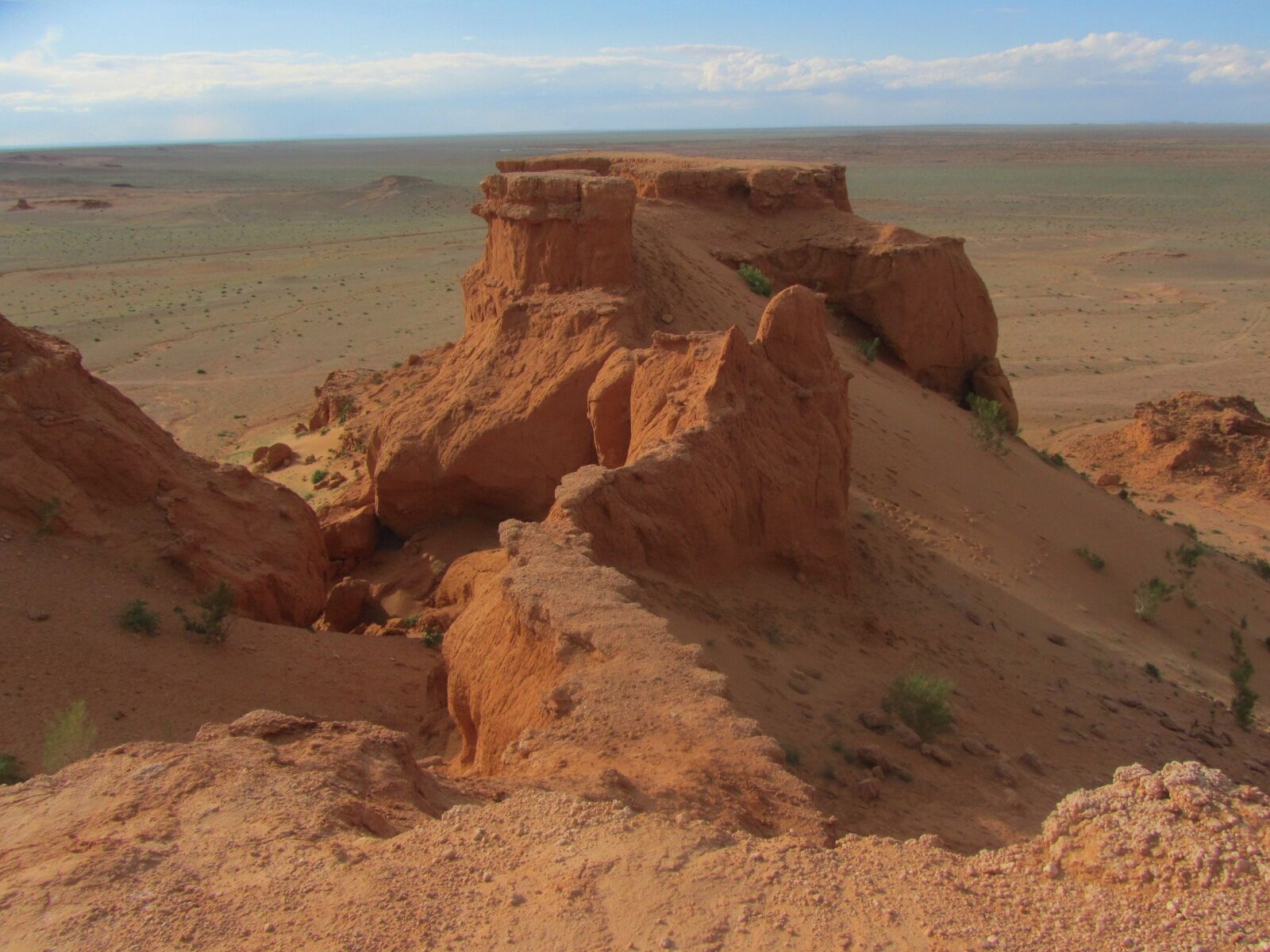 The Flaming Cliffs are where the real Indiana Jones discovered dinosaur eggs - the first to be unearthed!  Roy Chapman Andrews travelled to this area back in the 1920s over impossible landscapes. #Gobi #troveon