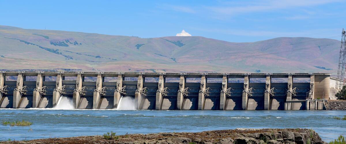 Panorama of water flowing through the Dalles Dam at The Dalles, Oregon, USA