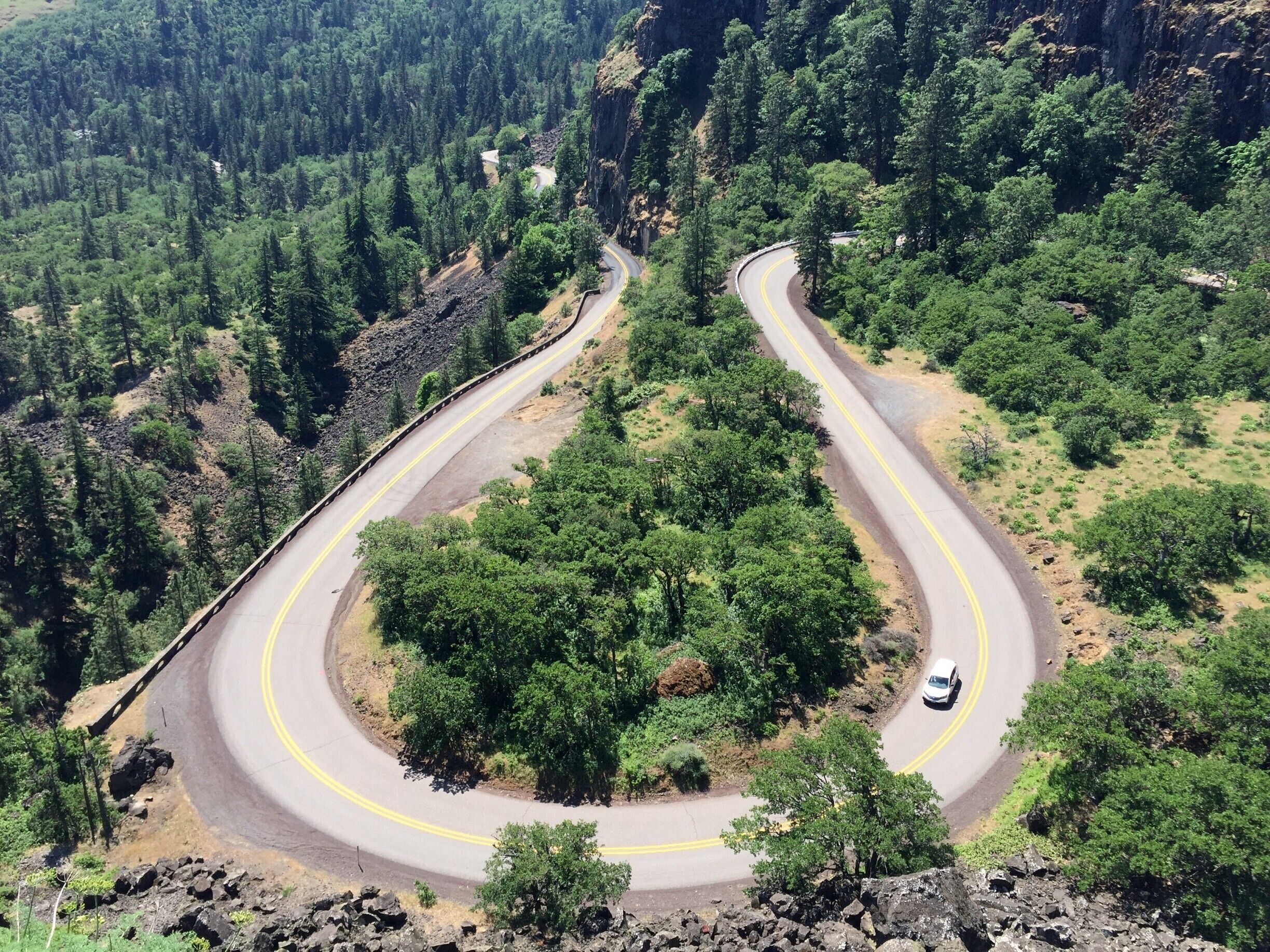 Tucked in Oregon is a windy road that follows Mother Nature's curves, leading to this amazing viewpoint.  Go on a hot summer day so that you can see the clear blue skies reflect onto the Columbia River. #LifeAtExpedia