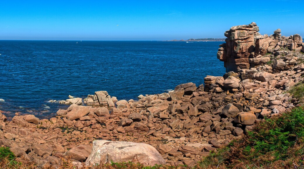 Monolithic blocks of pink granite in the Cotes d'Armor in Brittany, France. Pink granite coast