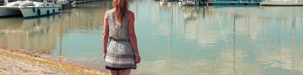 Woman tourist visiting Rochefort city and port- Charente Maritime in France