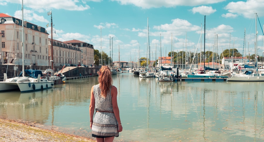 Woman tourist visiting Rochefort city and port- Charente Maritime in France