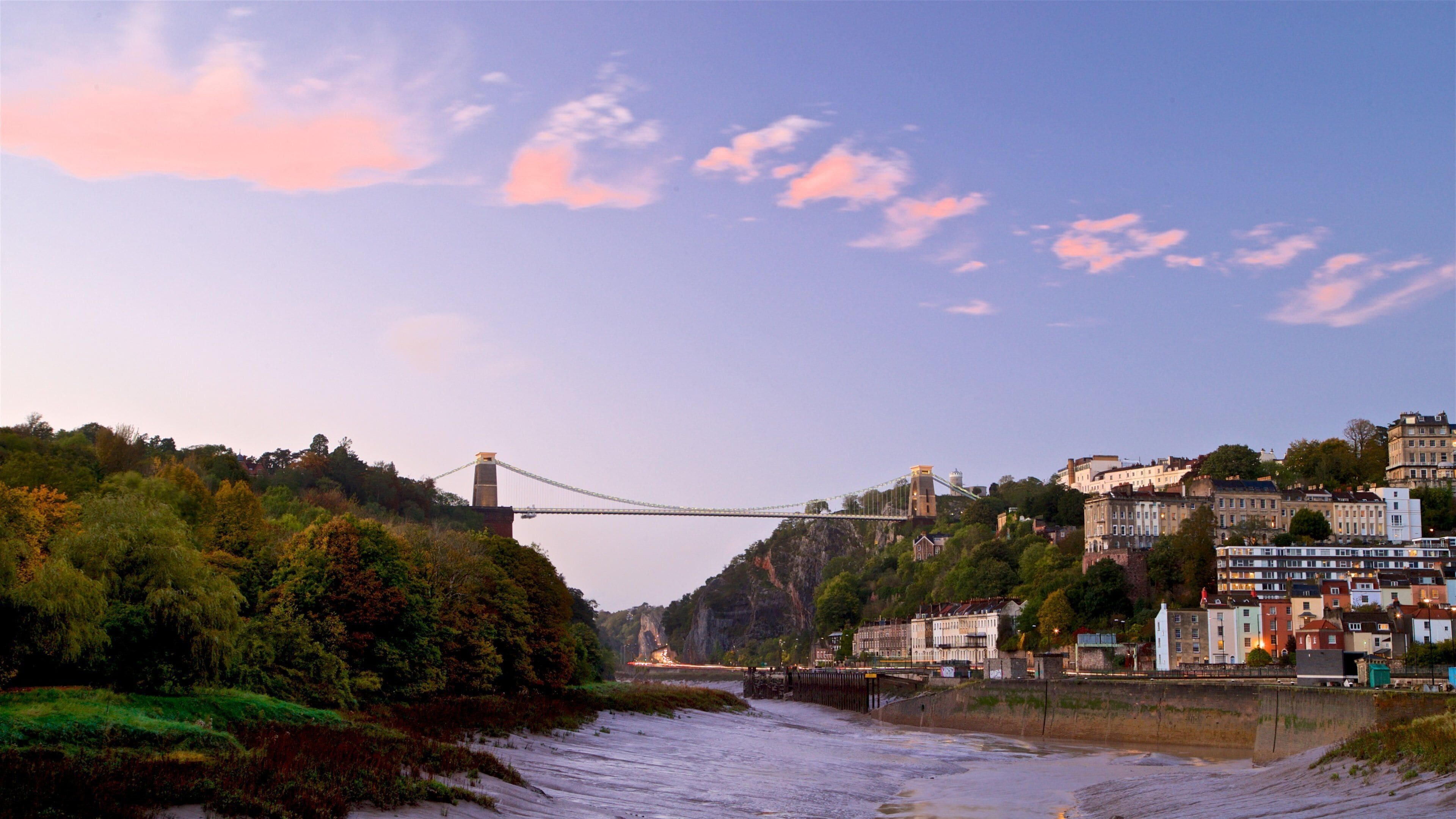 Bristol mostrando uma ponte, um pôr do sol e um rio ou córrego
