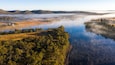 Storm King Dam showing a river or creek, mist or fog and landscape views