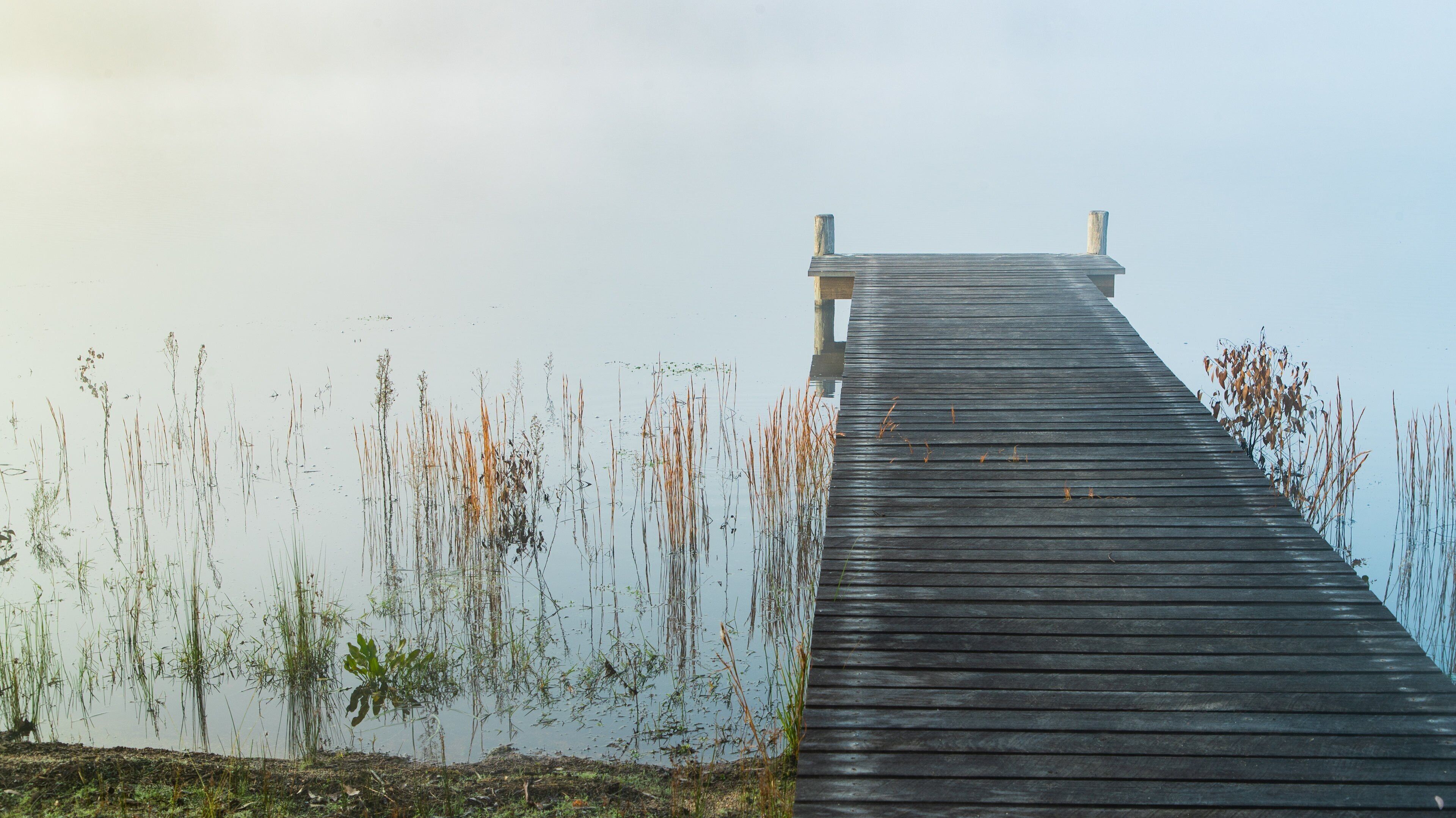 Storm King Dam featuring mist or fog and a lake or waterhole